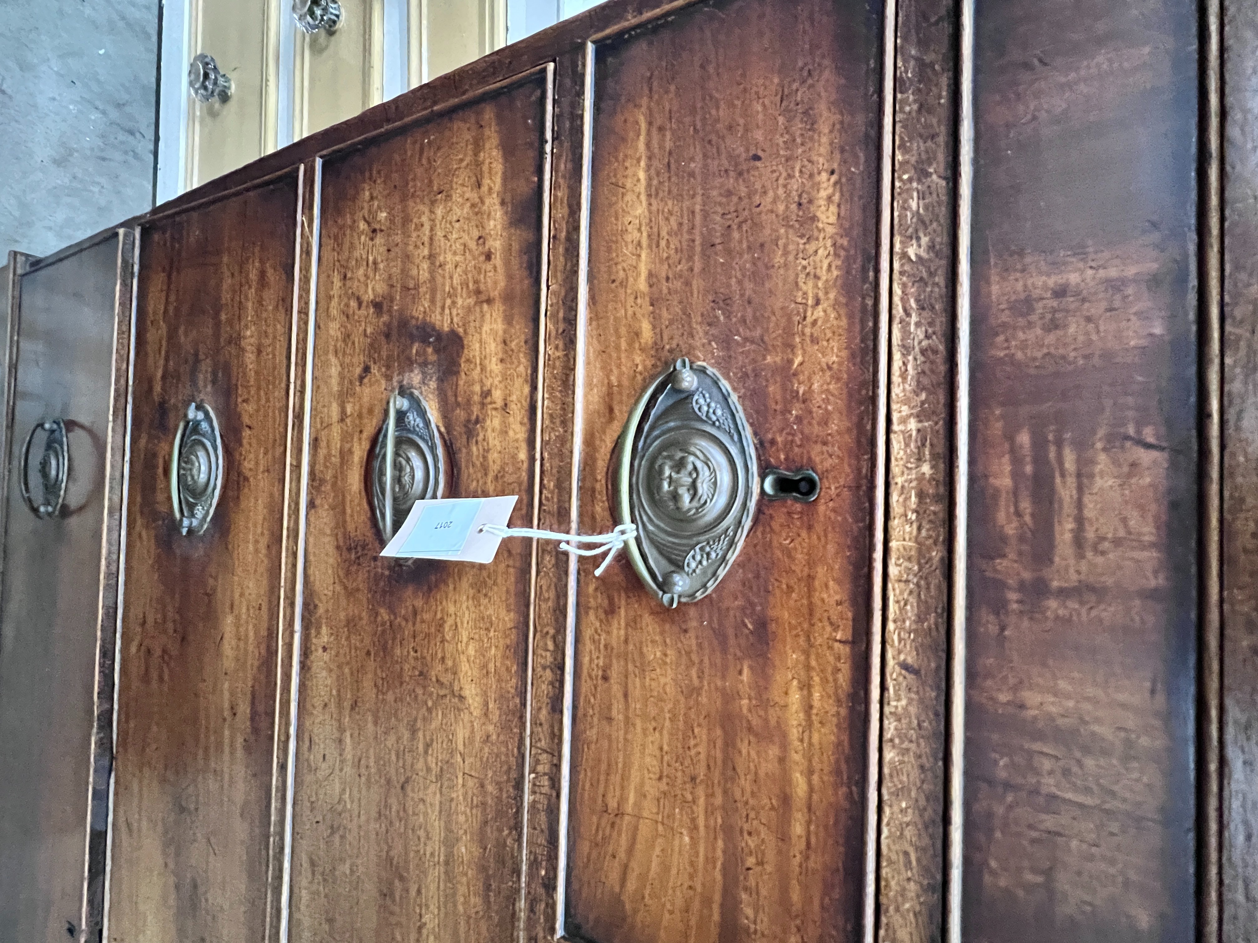 A George III North Country mahogany press cupboard, length 124cm, depth 56cm, height 211cm